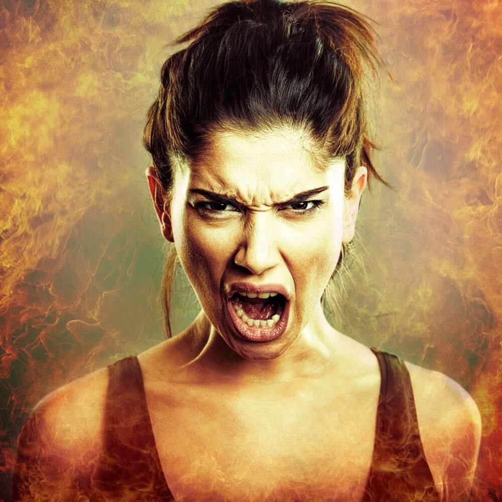 Person seen from behind with a fiery background, understanding adult temper tantrums in NYC.