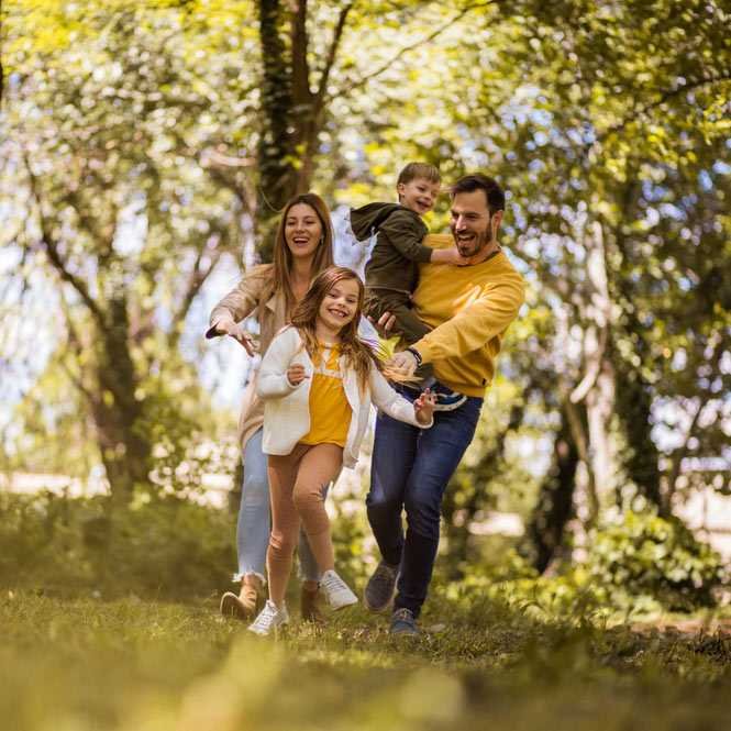 Parents spending time with their children outside