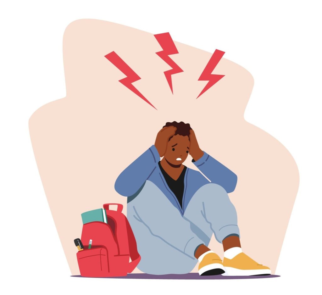 A person sitting on the ground suffering an Anxiety Attack