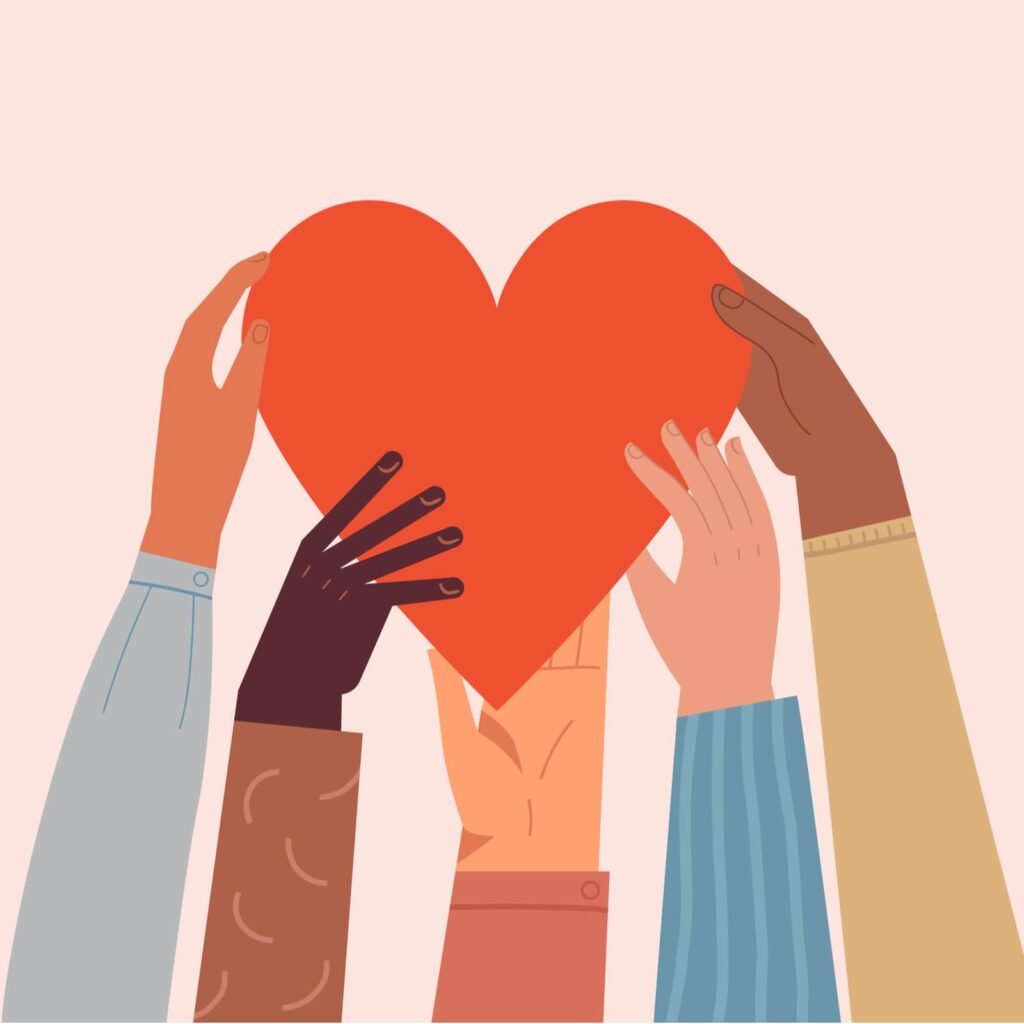 Heart holding by diverse hands