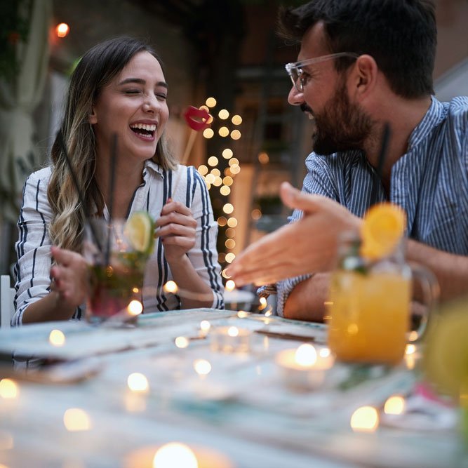 Young adult couple talking at cafe, friends, couple, conversation, fun concept