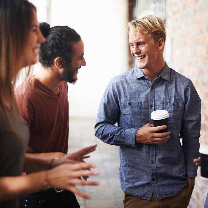 Enjoying a conversation with collegues.