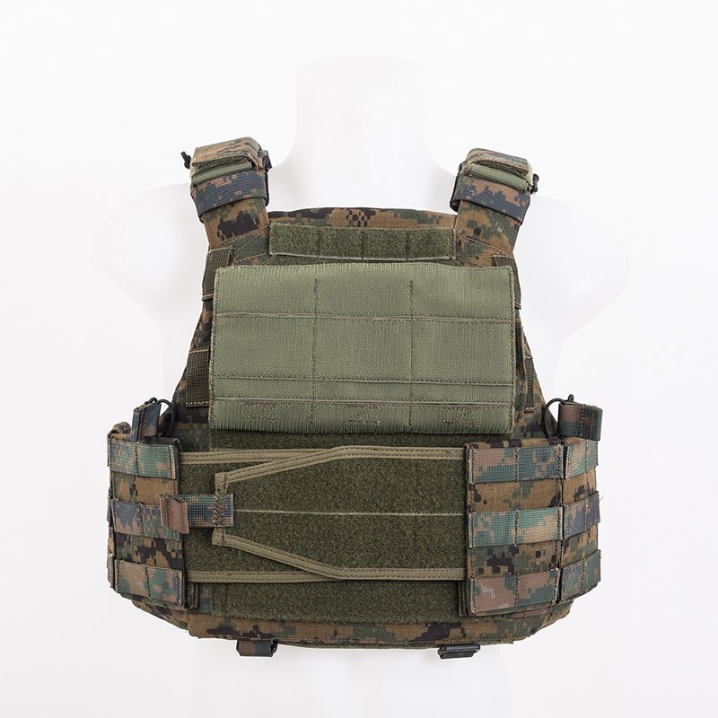 Camouflage bulletproof vest on a mannequin, illustrating body armoring and somatic healing in NYC.