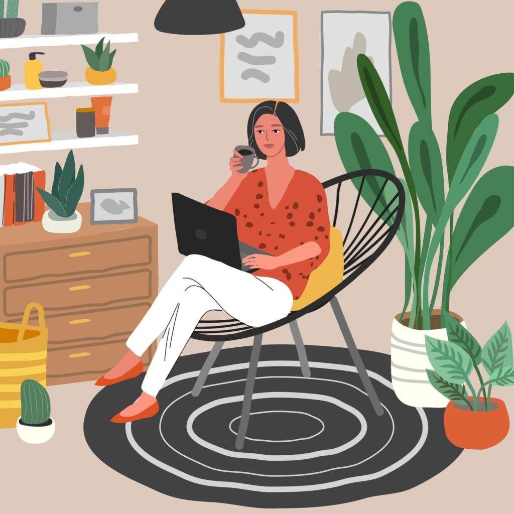 Cute woman sitting on chair with laptop