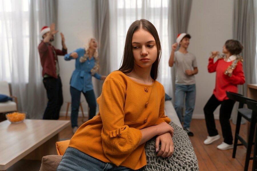 shyness vs social anxiety - a young woman suffering from social anxiety