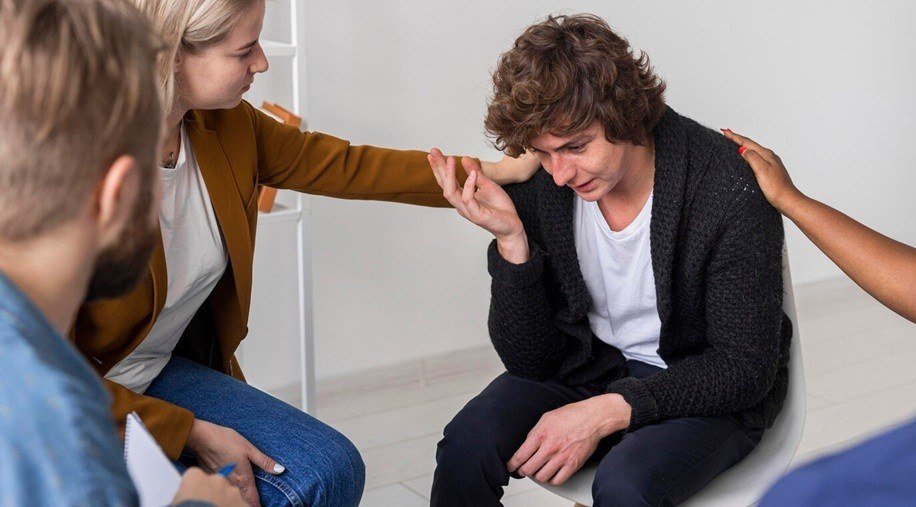 borderpolar - Community helping a sad man